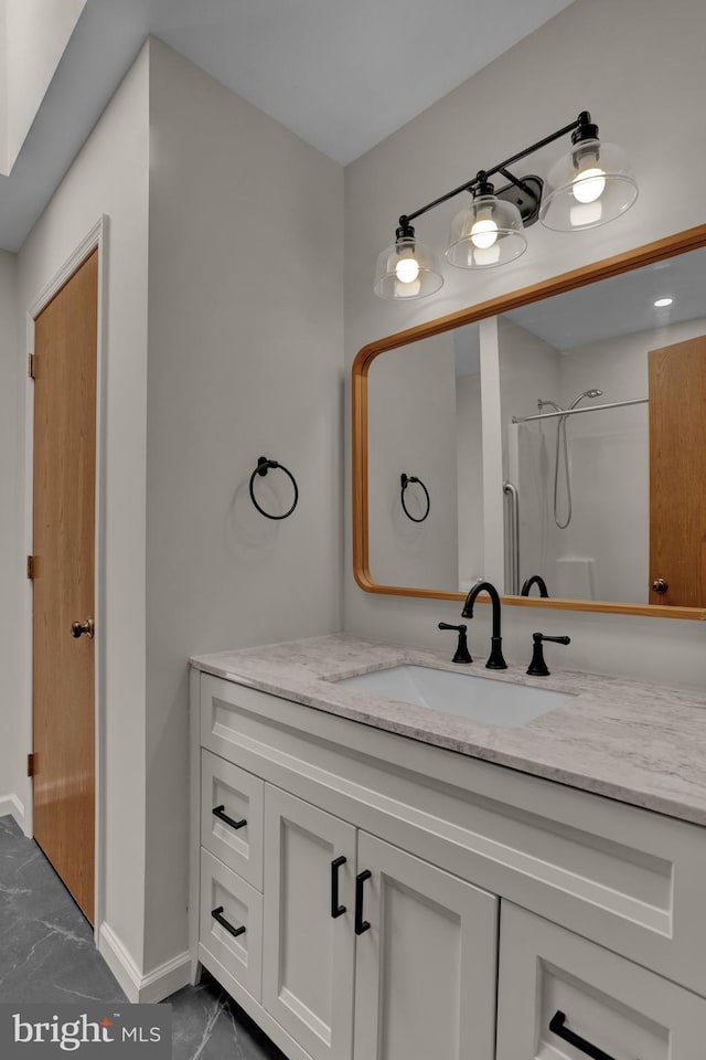 129 Deck Rd, Womelsdorf, PA 19567 - full bath with vanity, marble look tiles, and a shower
