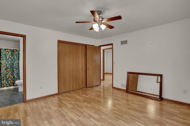 129 Deck Rd, Womelsdorf, PA 19567 - unfurnished bedroom featuring light wood-style floors, a closet, and connected bathroom