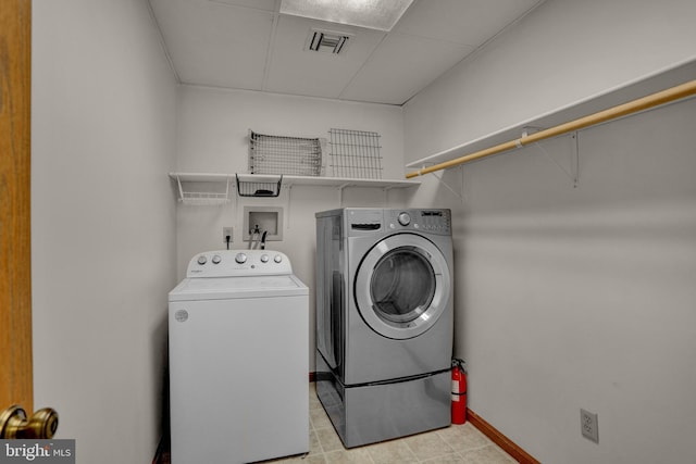 129 Deck Rd, Womelsdorf, PA 19567 - laundry area featuring separate washer and dryer and baseboards