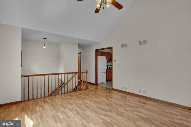 129 Deck Rd, Womelsdorf, PA 19567 - empty room with ceiling fan, wood finished floors, and high vaulted ceiling
