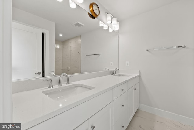 8790 Kensington Church St, Manassas, VA 20112 - bathroom featuring marble finish flooring, baseboards, double vanity, a stall shower, and recessed lighting