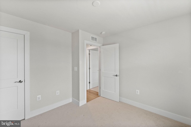 8790 Kensington Church St, Manassas, VA 20112 - unfurnished bedroom with carpet and baseboards