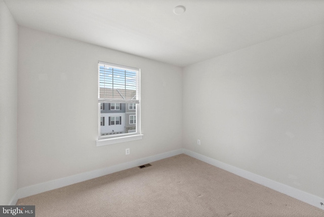 8790 Kensington Church St, Manassas, VA 20112 - carpeted spare room featuring baseboards