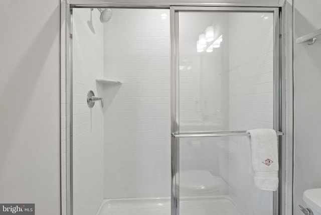 8790 Kensington Church St, Manassas, VA 20112 - full bathroom featuring a shower stall and toilet