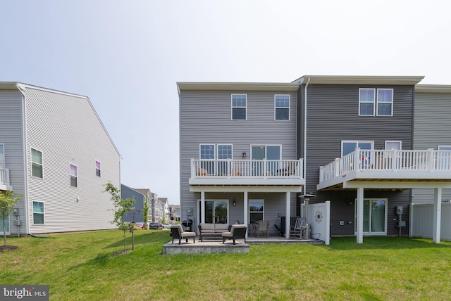 8790 Kensington Church St, Manassas, VA 20112 - back of property with an outdoor living space, a yard, and a patio