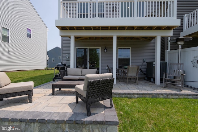 8790 Kensington Church St, Manassas, VA 20112 - view of patio with an outdoor living space and central AC unit