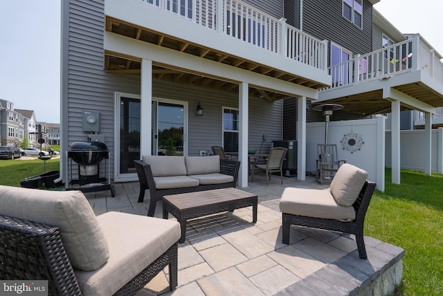 8790 Kensington Church St, Manassas, VA 20112 - view of patio featuring an outdoor hangout area, a grill, and a balcony