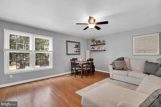 3363 Style Ave, Laurel, MD 20724 - living area with baseboards, a ceiling fan, and wood finished floors