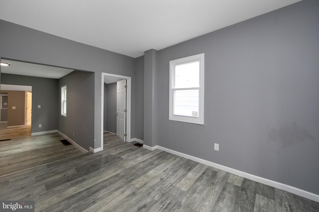 133 E Federal St, Burlington, NJ 08016 - empty room featuring baseboards, wood finished floors, and plenty of natural light