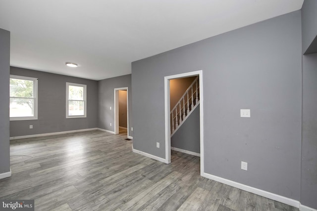 133 E Federal St, Burlington, NJ 08016 - spare room featuring wood finished floors, baseboards, and stairway