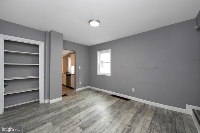 133 E Federal St, Burlington, NJ 08016 - unfurnished bedroom featuring wood finished floors and baseboards