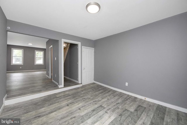 133 E Federal St, Burlington, NJ 08016 - unfurnished bedroom with baseboards, wood finished floors, and a closet