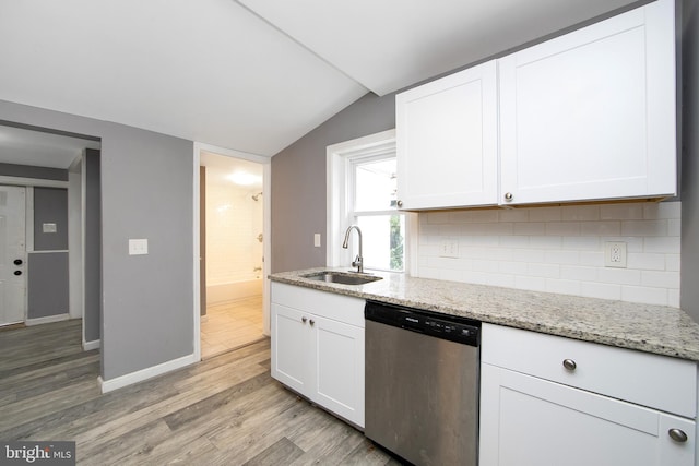 133 E Federal St, Burlington, NJ 08016 - kitchen with dishwasher, a sink, lofted ceiling, light wood finished floors, and backsplash