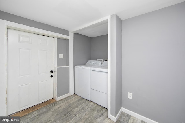 133 E Federal St, Burlington, NJ 08016 - laundry area with washing machine and clothes dryer, light wood finished floors, and baseboards