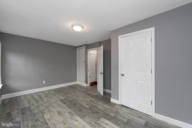 133 E Federal St, Burlington, NJ 08016 - unfurnished bedroom with wood finished floors and baseboards