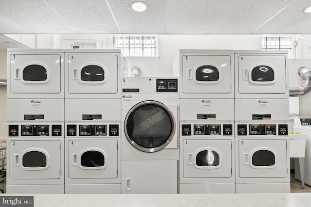 3901 Connecticut Ave NW Unit 406, Washington, DC 20008 - shared laundry featuring stacked washer / drying machine and washing machine and clothes dryer
