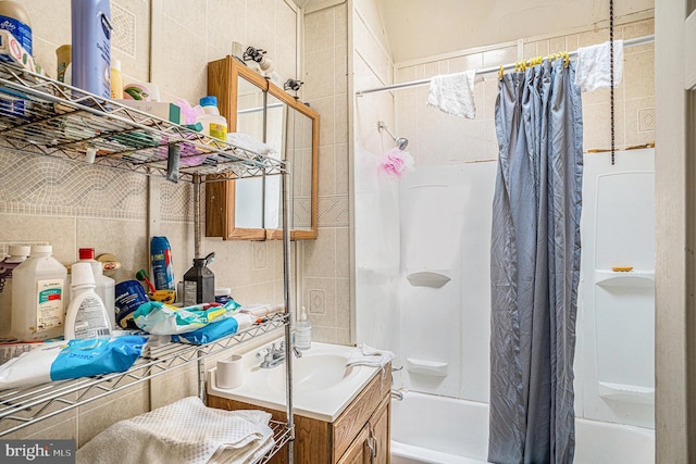 4336 Parrish St, Philadelphia, PA 19104 - full bathroom with vanity, shower / tub combo, and tile walls
