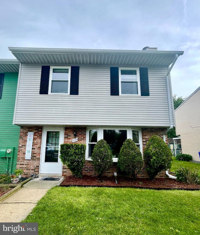 7719 Haines Ct, Laurel, MD 20707 - view of front of house with brick siding and a front lawn