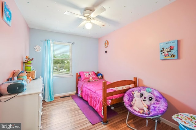 7719 Haines Ct, Laurel, MD 20707 - bedroom with wood finished floors and a ceiling fan