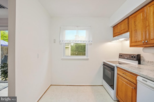 7719 Haines Ct, Laurel, MD 20707 - kitchen featuring white appliances, under cabinet range hood, light floors, brown cabinets, and light stone countertops