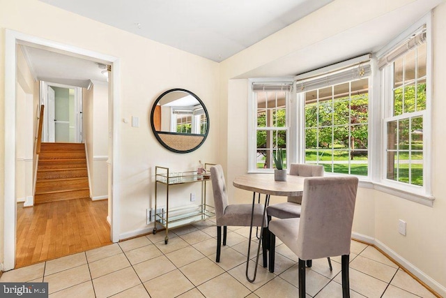 201 Mowbray Rd, Silver Spring, MD 20904 - dining room featuring light tile patterned floors, baseboards, and stairway
