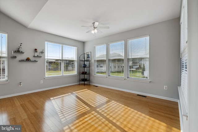 31746 Chablis Ln Unit 71, Lewes, DE 19958 - unfurnished room with a ceiling fan, wood finished floors, and baseboards