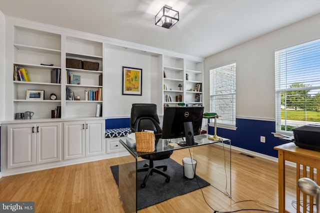 31746 Chablis Ln Unit 71, Lewes, DE 19958 - office featuring light wood finished floors, baseboards, and built in shelves