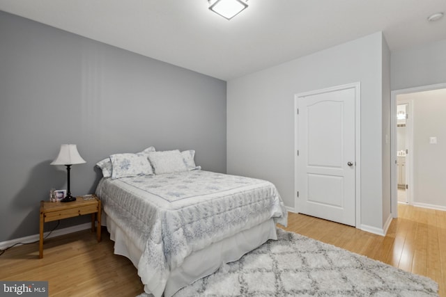 31746 Chablis Ln Unit 71, Lewes, DE 19958 - bedroom with light wood finished floors and baseboards