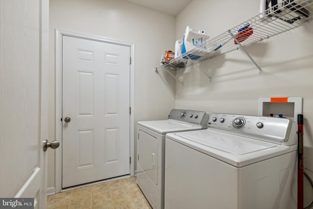 31746 Chablis Ln Unit 71, Lewes, DE 19958 - laundry area with separate washer and dryer