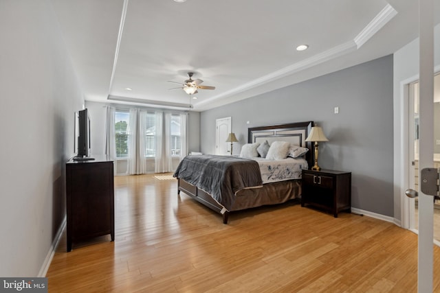31746 Chablis Ln Unit 71, Lewes, DE 19958 - bedroom with a raised ceiling, light wood-style floors, baseboards, ceiling fan, and recessed lighting