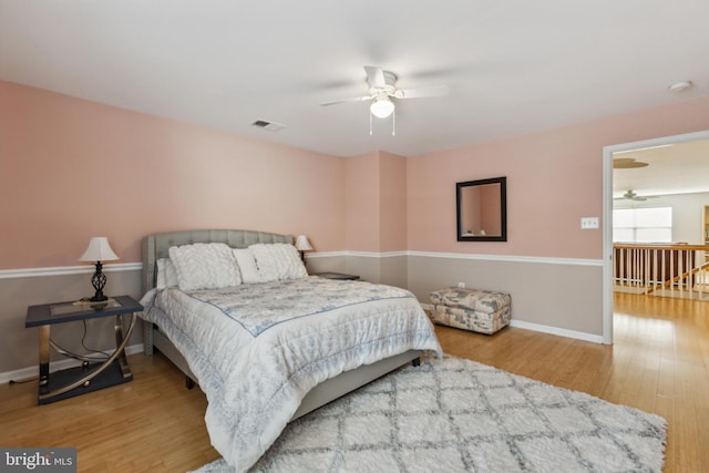 31746 Chablis Ln Unit 71, Lewes, DE 19958 - bedroom with wood finished floors, baseboards, and ceiling fan
