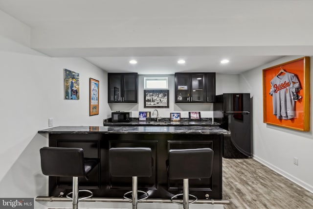31746 Chablis Ln Unit 71, Lewes, DE 19958 - indoor wet bar featuring freestanding refrigerator, wood finished floors, baseboards, and recessed lighting