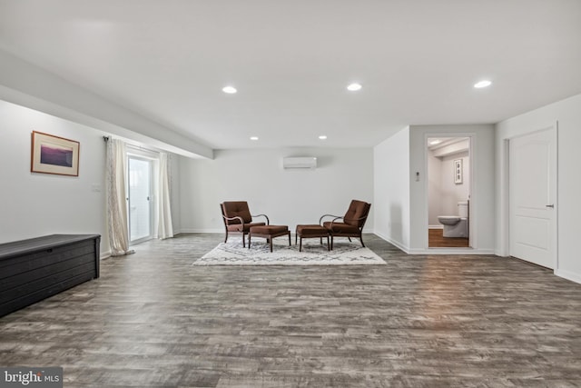 31746 Chablis Ln Unit 71, Lewes, DE 19958 - living area with a wall mounted AC, wood finished floors, baseboards, and recessed lighting