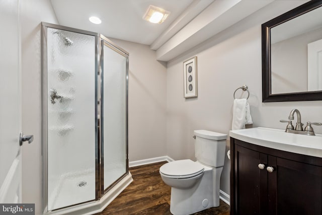 31746 Chablis Ln Unit 71, Lewes, DE 19958 - full bath with vanity, a shower stall, baseboards, toilet, and wood finished floors