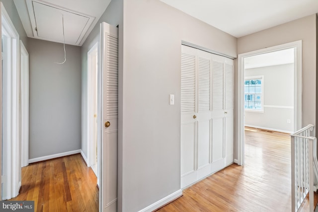 9523 Greencastle Ln, Lorton, VA 22079 - hallway featuring attic access, light wood-type flooring, and baseboards
