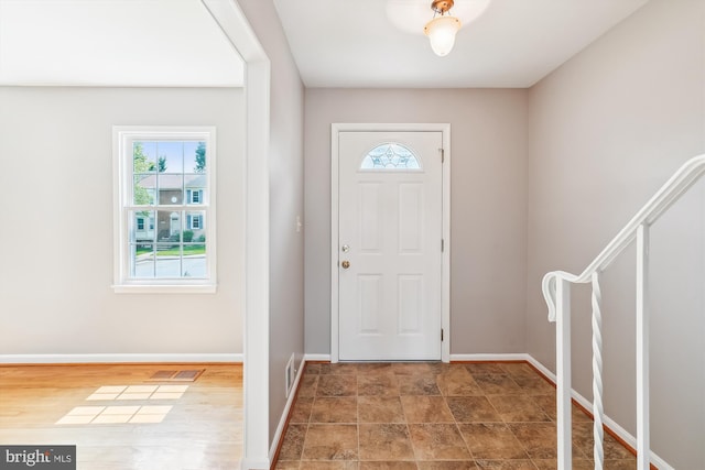 9523 Greencastle Ln, Lorton, VA 22079 - entryway with healthy amount of natural light, baseboards, and stairway