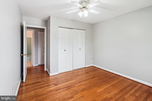 9523 Greencastle Ln, Lorton, VA 22079 - unfurnished bedroom with light wood finished floors, baseboards, a closet, and ceiling fan