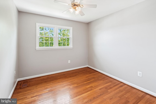9523 Greencastle Ln, Lorton, VA 22079 - unfurnished room with wood finished floors, baseboards, and ceiling fan