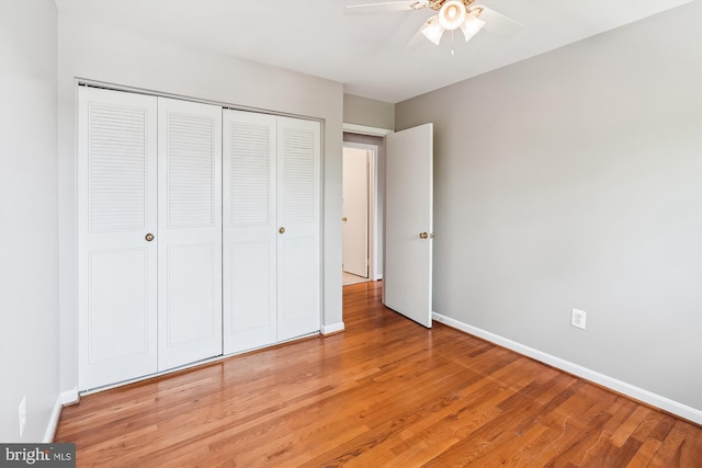 9523 Greencastle Ln, Lorton, VA 22079 - unfurnished bedroom featuring a closet, light wood-style floors, and baseboards
