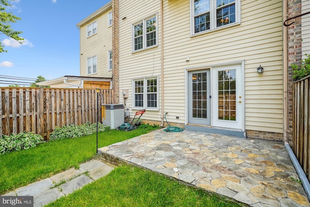 9523 Greencastle Ln, Lorton, VA 22079 - rear view of house with central AC unit and a patio area
