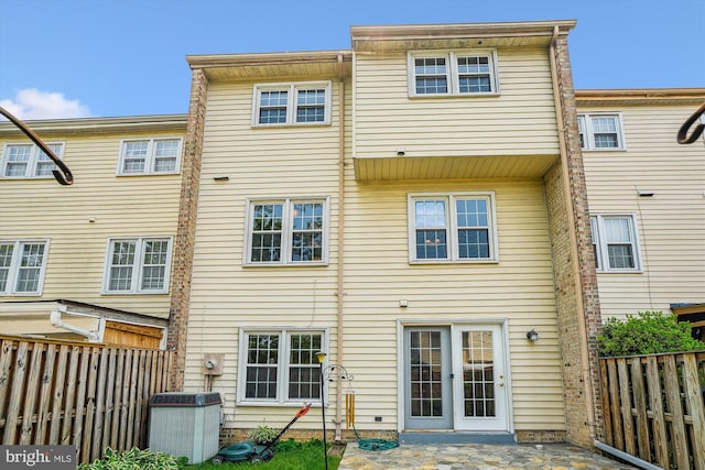 9523 Greencastle Ln, Lorton, VA 22079 - back of house featuring cooling unit and a patio area