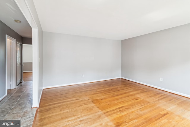 9523 Greencastle Ln, Lorton, VA 22079 - empty room featuring baseboards, a smoke detector, and light wood-style flooring