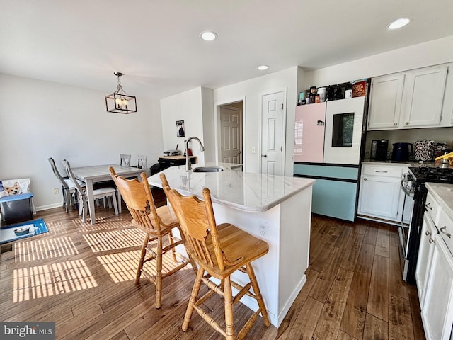 23 Lilyberry Pl, Delran, NJ 08075 - kitchen with freestanding refrigerator, stainless steel range with gas cooktop, a sink, dark wood-style flooring, and recessed lighting