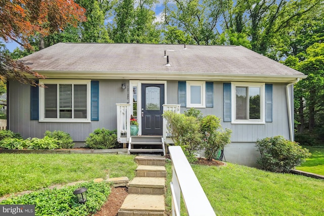 10105 Meredith Ave, Silver Spring, MD 20910 - view of front of home featuring a front yard and roof with shingles