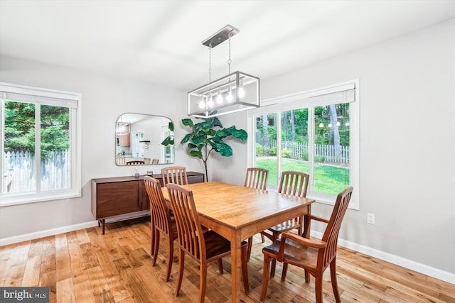 10105 Meredith Ave, Silver Spring, MD 20910 - dining room featuring light wood-style flooring, healthy amount of natural light, and baseboards