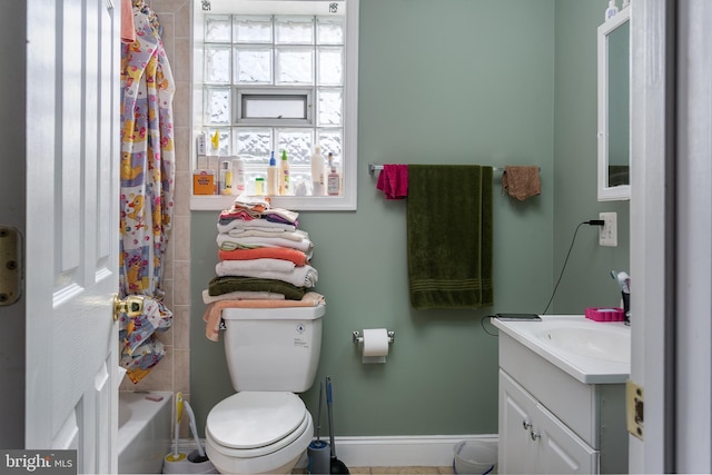 2421 E Madison St E, Baltimore, MD 21205 - bathroom featuring vanity and shower / bath combo with shower curtain