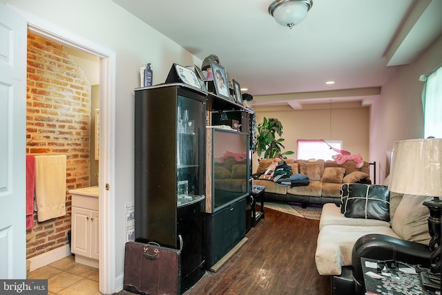 2421 E Madison St E, Baltimore, MD 21205 - sitting room featuring healthy amount of natural light, brick wall, and recessed lighting