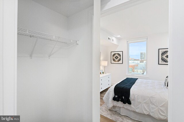 701 N Henry St Unit 212, Alexandria, VA 22314 - bedroom with wood finished floors