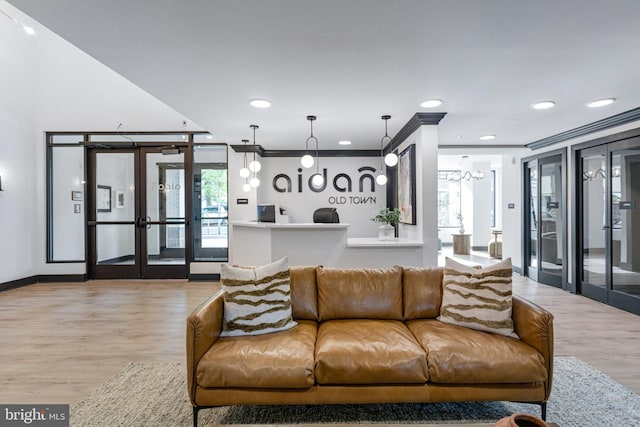 701 N Henry St Unit 212, Alexandria, VA 22314 - reception with french doors, ornamental molding, recessed lighting, and a chandelier