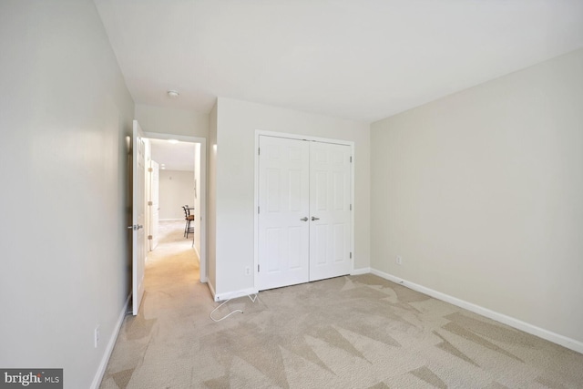 1117 Primrose Ct Unit 304, Annapolis, MD 21403 - unfurnished bedroom with carpet, a closet, and baseboards